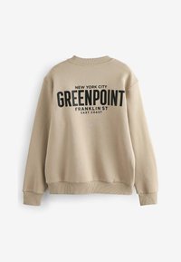 Bežani dukserica s rebrastim ovratnikom i manžetama, sa podebljanim crnim tekstom koji na leđima glasi "GREENPOINT" i "NEW YORK CITY".