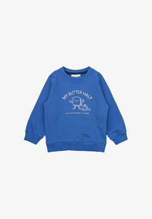 Sudadera azul con mangas raglán largas, con un gráfico de pan tostado y mantequilla sonrientes. El texto dice "MI MITAD DE MANTEQUILLA" en blanco.