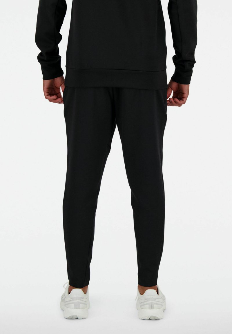 New Balance TECH Pantalones deportivos black/negro