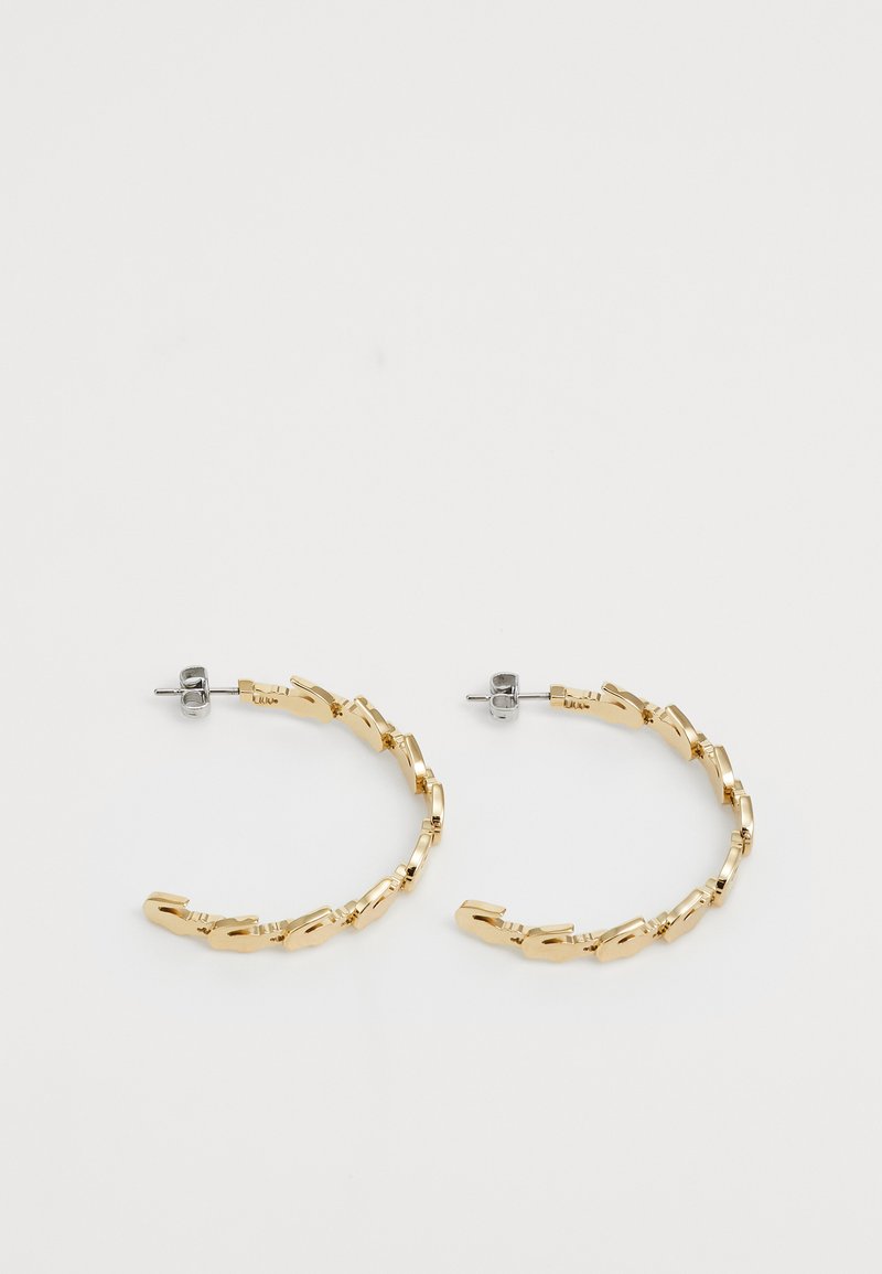 Gold hoop earrings with a linked design. Smooth metal texture, featuring silver hardware for fastening. Circular shape, medium size.