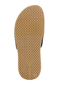 Semelle en caoutchouc avec un motif en zigzag, de couleur beige avec des accents foncés et un logo en relief au centre. Texture lisse dans l'ensemble.