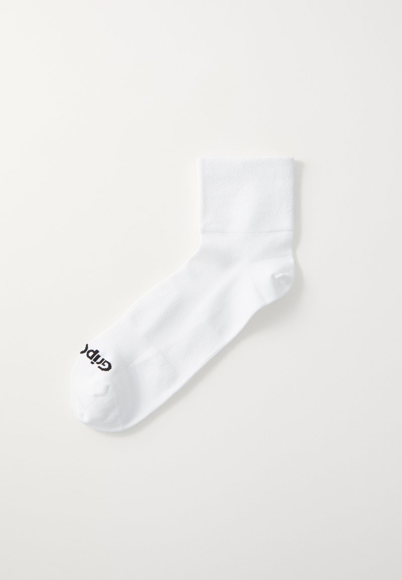 Calzino bianco in cotone con risvolto a coste e un logo stampato nero vicino alla punta. Texture liscia e design di lunghezza media fino al polpaccio.