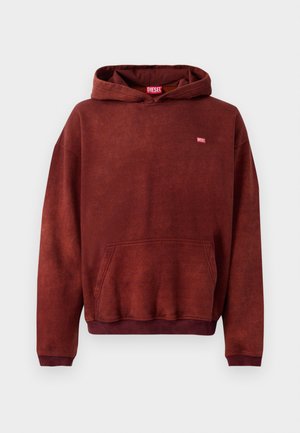 Sudadera de color rojo-marrón hecha de tela suave, con un bolsillo en el frente y puños de canalé. Pequeño logo "DIESEL" en color contrastante en el pecho.