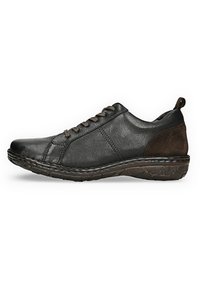 Mustat nahast sneakersid pruuni sametiga, ümmargune varvas, nööridega disain ja tekstuuriga kummist põhi haardeks. Õmblused külgedel.