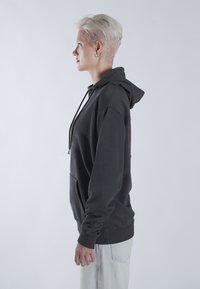 Mira Paris PINS BACK EMBROIDERY UNISEX - Pulover s kapuco - black