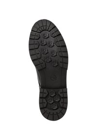 Semelle de chaussure en caoutchouc noir avec des motifs texturés de grip, dotée de grands crampons hexagonaux pour une meilleure adhérence et d'une zone de support plantaire plate.