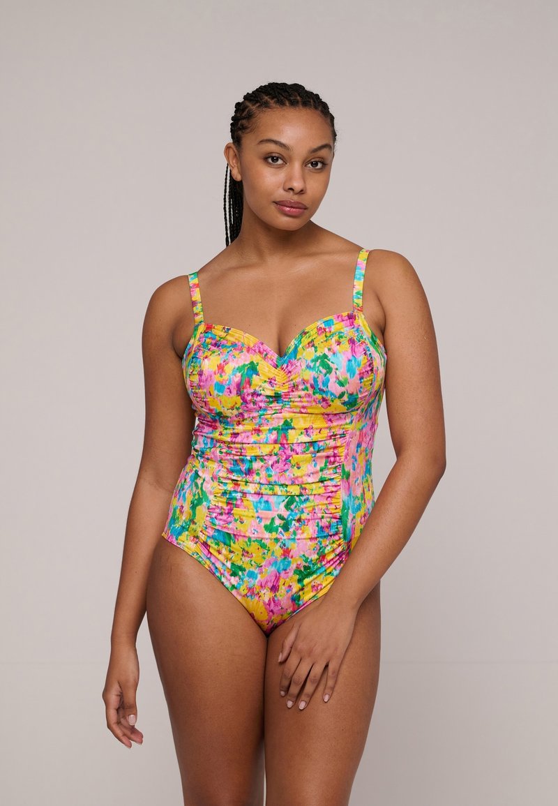 Yksiosainen värikäs uimapuku, jossa on säädettävät olkahihnat. Uimapuvussa on pinkki, keltainen ja vihreä kukkakuosi sekä teksturoidut rypytetty sivut.