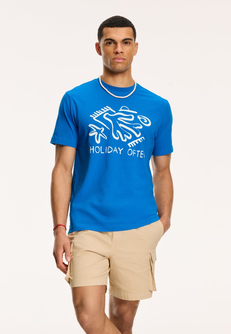 Shiwi Triko s potiskem - skydive blue