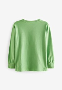 Long-sleeve shirt in bright green cotton. Round neckline, elastic cuffs, and a smooth texture with no visible patterns or accents.