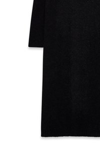 Mustat neulotut mekko, jossa on pitkät hihat, rento istuvuus ja ribbaushelma. Pehmeä pinta ilman näkyviä kuvioita tai metalliosia.