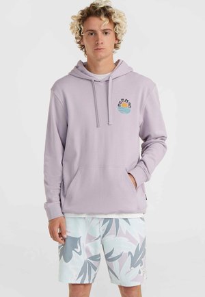 Light purple hoodie with a front pocket, drawstring hood, and a sun and ocean graphic on the chest; paired with patterned pastel shorts.