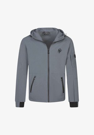 Giacca grigia con zip e cappuccio. Presenta due tasche frontali con zip e un logo sul petto. Applicazioni nere sulle zip e sui polsini. Texture liscia.
