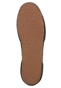 Sula till sko med en texturerad, gummiliknande yta. Mörka kanter kontrasterar med ett ljusbrunt, mönstrat centralt område, utformat för grepp och hållbarhet.