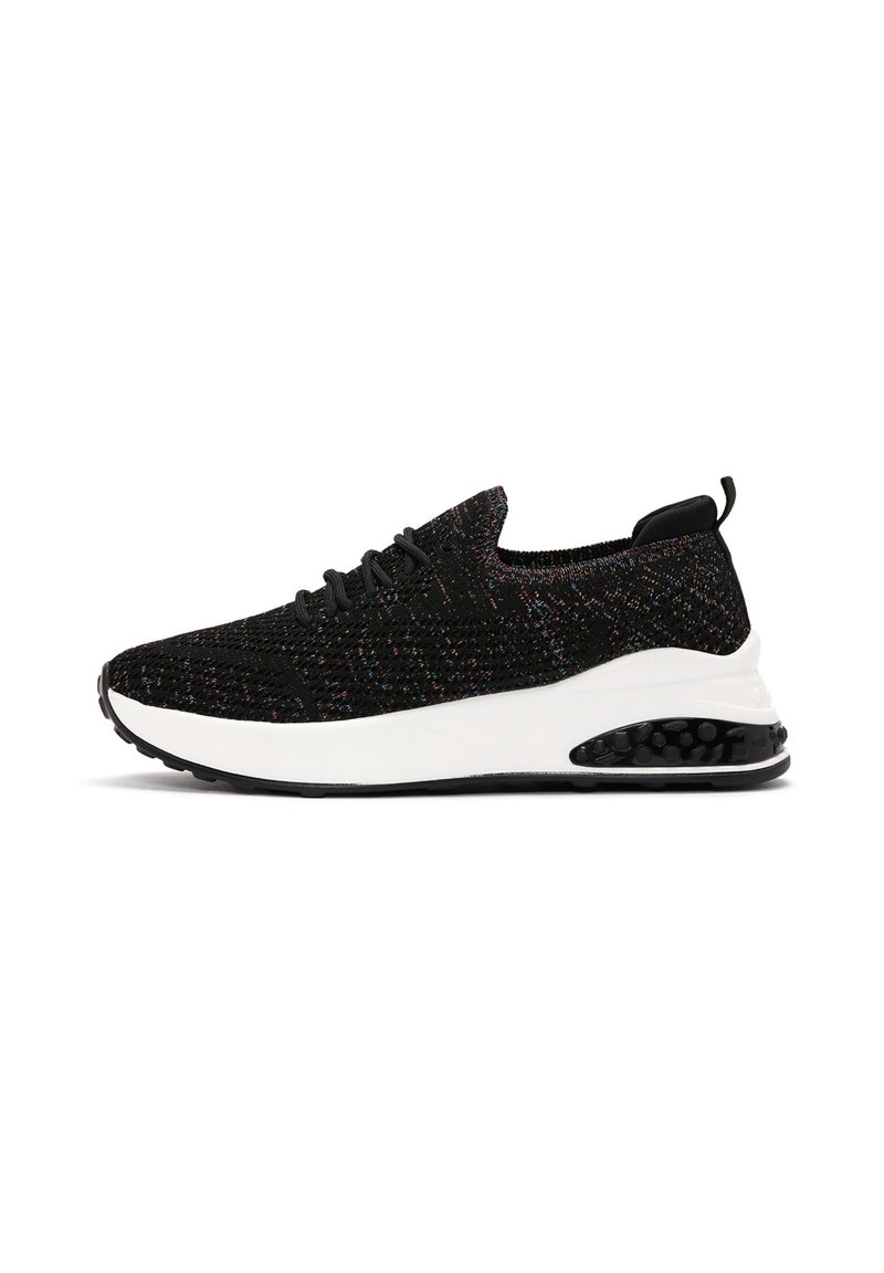 Black athletic shoe with a textured knitted upper, white midsole, and a black rubber sole featuring a visible air cushioning unit.