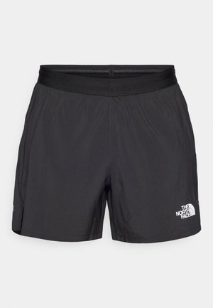 Black shorts made from lightweight fabric, featuring an elastic waistband and a small white logo on the lower right side.