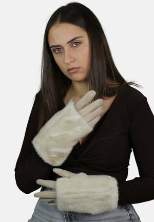 Beżowe rękawiczki o miękkiej, puszystej fakturze, z długim mankietem i dopasowanymi palcami. Materiał łączy sztuczne futro z gładkim wykończeniem.