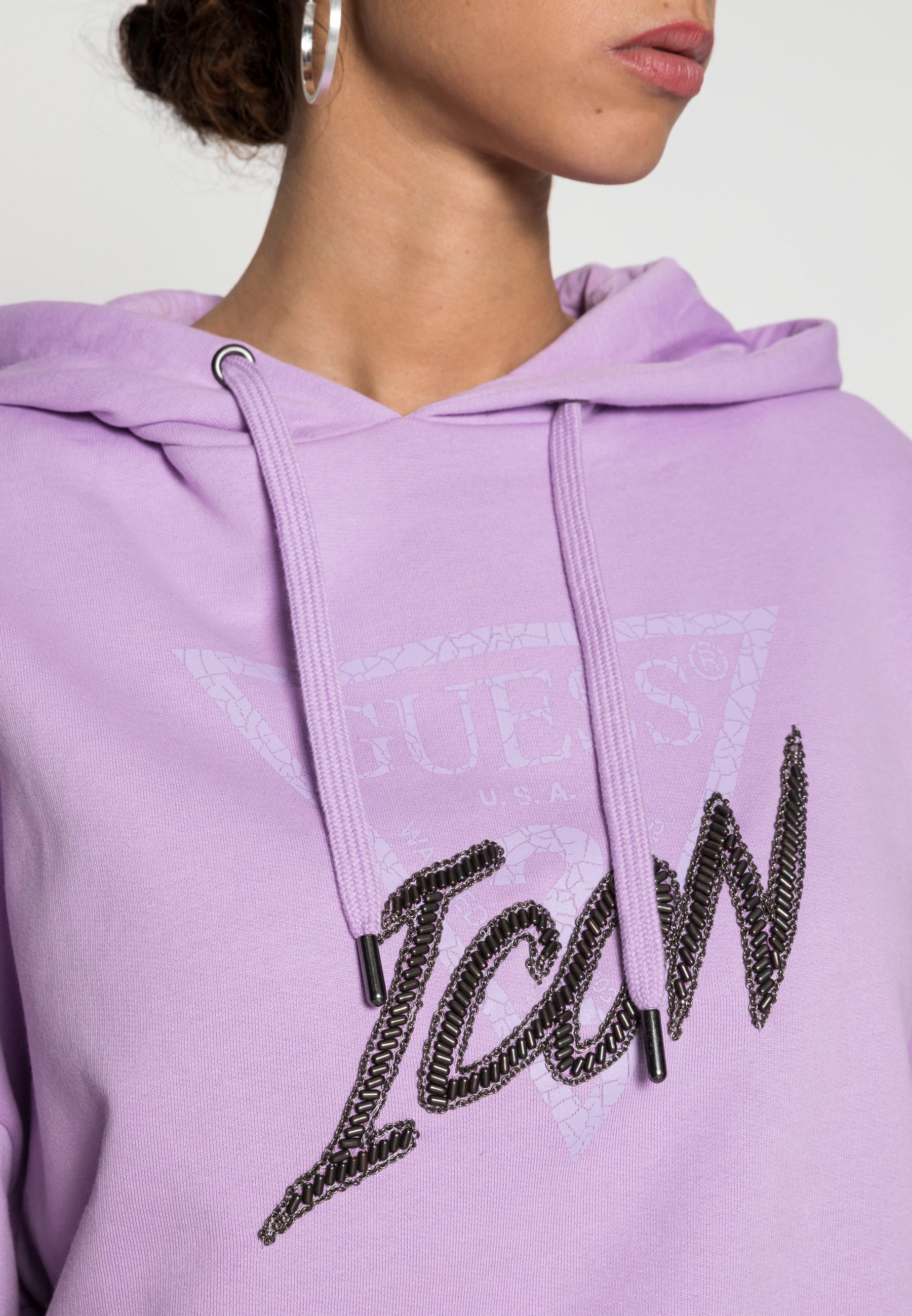 purple guess sweatshirt