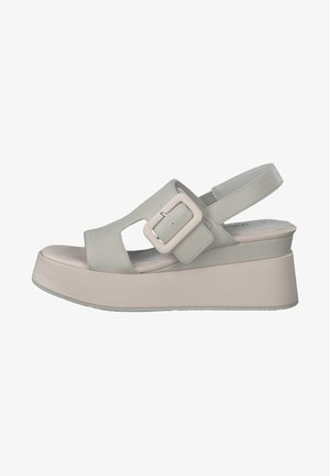 Light grey platform sandal with a wide strap featuring a rectangular buckle, open toe design, and textured sole.