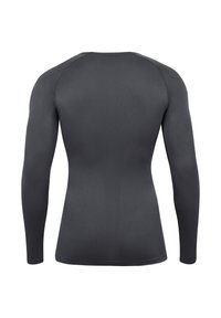 Langsleeve shirt in donkergrijs, gemaakt van een rekbare, gestructureerde stof. Heeft een ronde halslijn en een aansluitende pasvorm. Naadloze schouders.