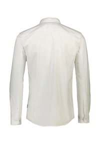 Witte lange mouwen overhemd met een klassieke kraag, zacht katoenen stof en een ronde zoom. Inclusief knoopmanchetten en rugplooien.