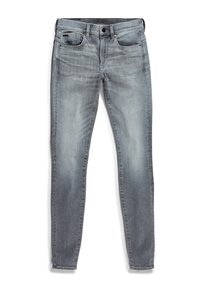 Jeans grises deslavados de mezclilla, con un diseño ajustado, cinco bolsillos y cierre de botón. Ligera decoloración en la tela.