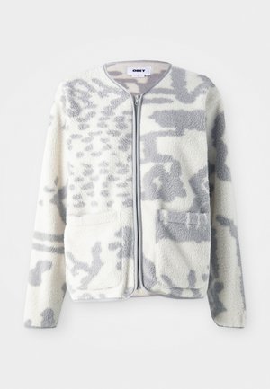 Fleece jacket in crème en grijs met een ritssluiting, twee voorkeurszakken en een zachte, gestructureerde oppervlakte met een subtiel abstract patroon.