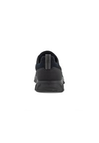 Black athletic shoe featuring a mesh upper and a sturdy rubber sole. The heel exhibits a textured panel and a central pull tab for easy wear.