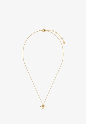 Złoty naszyjnik z delikatnym łańcuszkiem i zawieszką w kształcie kokardki. Posiada zapięcie typu homar oraz regulowaną długość z przedłużką.