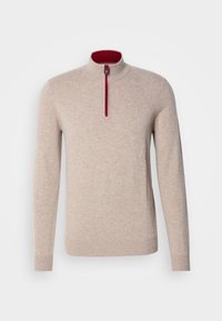 Beige pullover sweater with a high collar and a short zipper. Features red accents along the zipper and a smooth, soft texture.