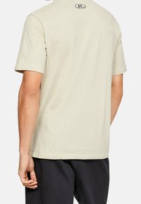 Under Armour Camiseta estampada - beige