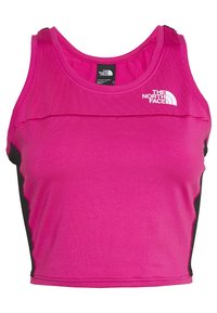 Rosa atletisk crop top med svarta sidopaneler, tillverkad av texturerad tyg. Har logotyp framtill och rundad halsringning. Ingen synlig hårdvara.