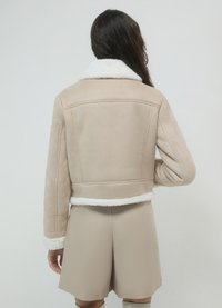 Calliope MONTONE  - Giacca in similpelle - beige