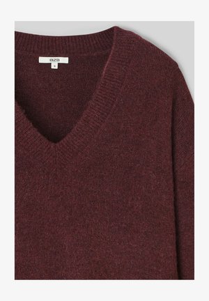 Pull en V bordeaux en maille douce. Doté d'un col et d'un ourlet côtelés, il présente une texture lisse et un design simple. Taille S.
