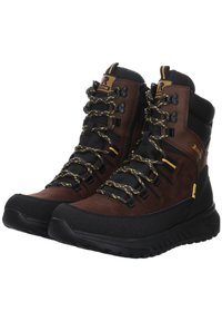 Bottines de randonnée en cuir marron et synthétique noir avec des accents jaunes, ajustement texturé, lacets robustes et col rembourré pour un soutien.