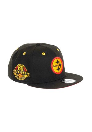 Black snapback hat featuring yellow eyelets, red accents, and embroidered "80 Seasons" logo with Pittsburgh Steelers emblem on the front.
