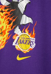 Nike Performance Camiseta estampada - purple