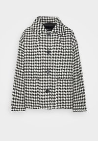 Czarna i biała marynarka w wzór houndstooth z kołnierzykiem, z przodem zapinanym na guziki i dwoma przednimi kieszeniami. Teksturowany materiał.