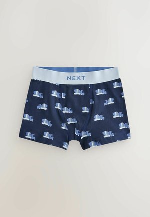 Boxer shorts blu navy con elastico azzurro che presenta il logo 'NEXT'. Decorati con grafiche ripetute di camion azzurri.