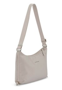 Light beige shoulder bag with adjustable strap and zipper closure, minimal branding on front, rectangular shape.