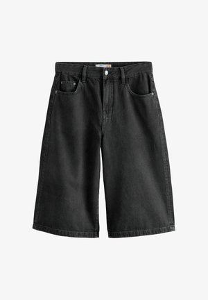 Mustad teksased lühikesed püksid, laia istuva lõikega, viie tasku disainiga ja metallist aksessuaaridega. Omab sirget jalgevahet ja vöökoha nööpkinni.