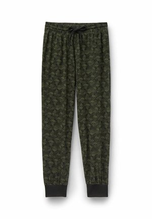 Pantalon de jogging vert foncé avec un motif intégral de crânes noirs, taille élastique avec cordon noir, et poignets de cheville noirs.