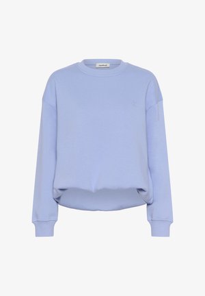 Pulover albastru deschis dintr-o țesătură moale, cu guler rotund, umeri căzuți și o croială lejeră, cu broderie minimală.