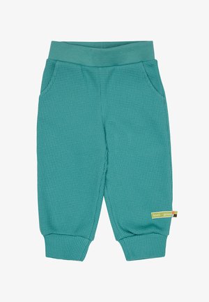 Teal waffle-structuurbroek met een brede elastische tailleband en twee zijzakken. Voorzien van rib gebreide manchetten en een klein merklabel aan de zijkant.