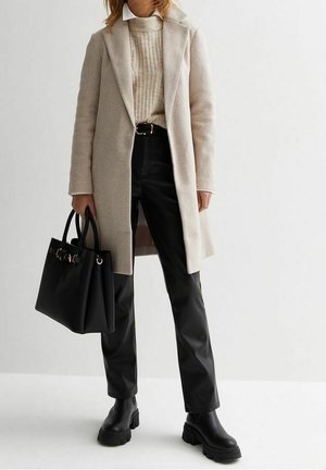 Halflange jas - beige