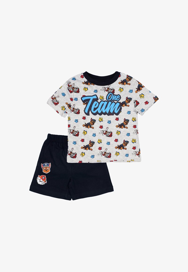 Graphic children's two-piece pajama set. Gray shirt with colorful dog prints and "One Team" text; navy blue shorts with character patches.