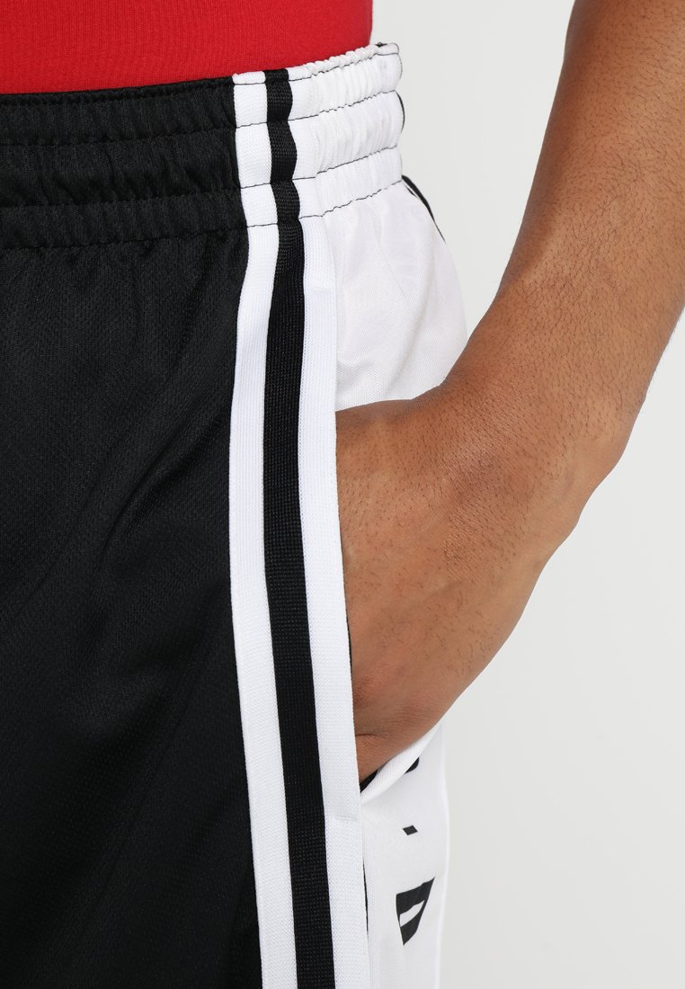 white and black jordan shorts