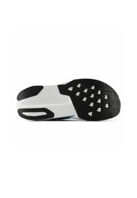 Black rubber outsole with a textured pattern, white midsole, and blue accent. Features a hexagonal design for grip and traction.