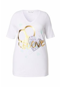 Camiseta de algodón blanca de manga corta, con cuello en V, que presenta gráficos dorados de corazones florales y la palabra "amor" en letras doradas.