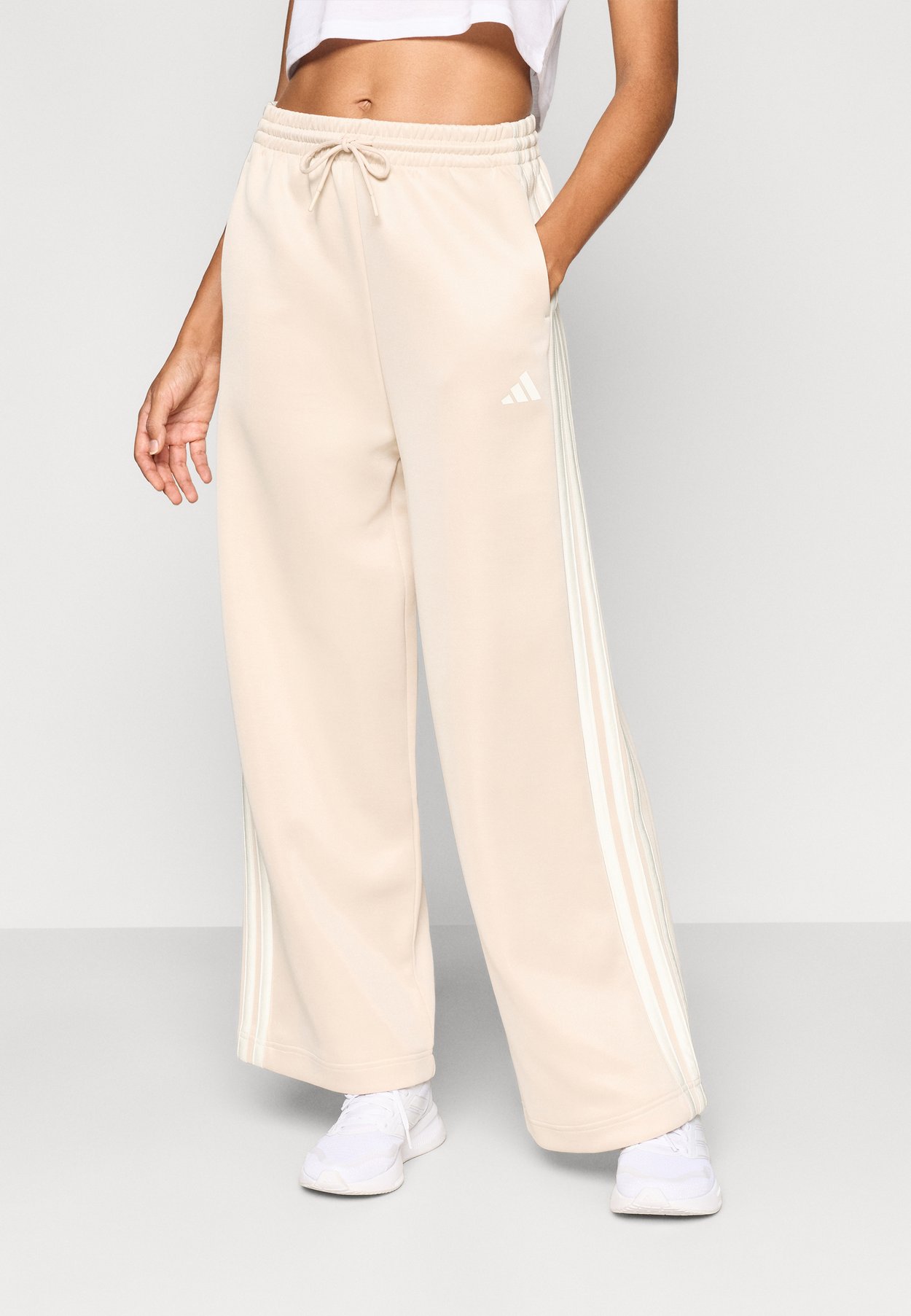 adidas W STADIUM TP - Pantalones deportivos - crystal linen/pure ruby/off white