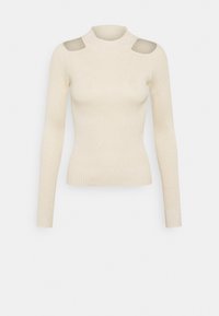 Cremfarbener, gerippter Pullover mit langen Ärmeln, hohem Kragen und Schulterauschnitten. Weiche Textur, figurbetontes Design und minimalistischer Stil ohne Muster.